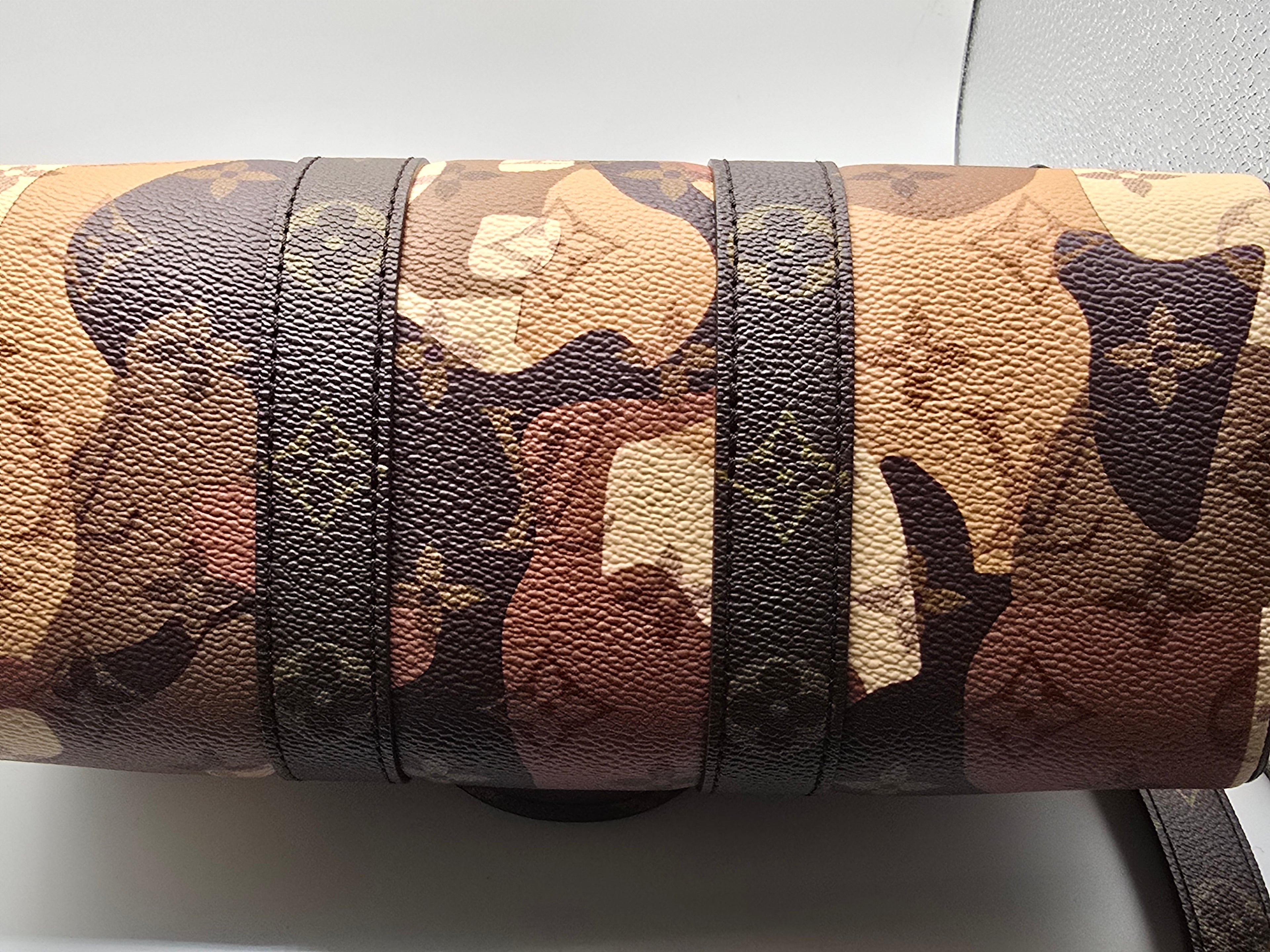 Louis Vuitton x Kid Super 2023 brown portrait keepall 25 bandouliere