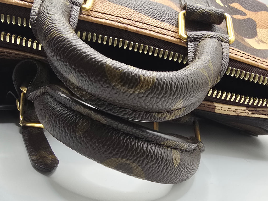 Louis Vuitton x Kid Super 2023 brown portrait keepall 25 bandouliere